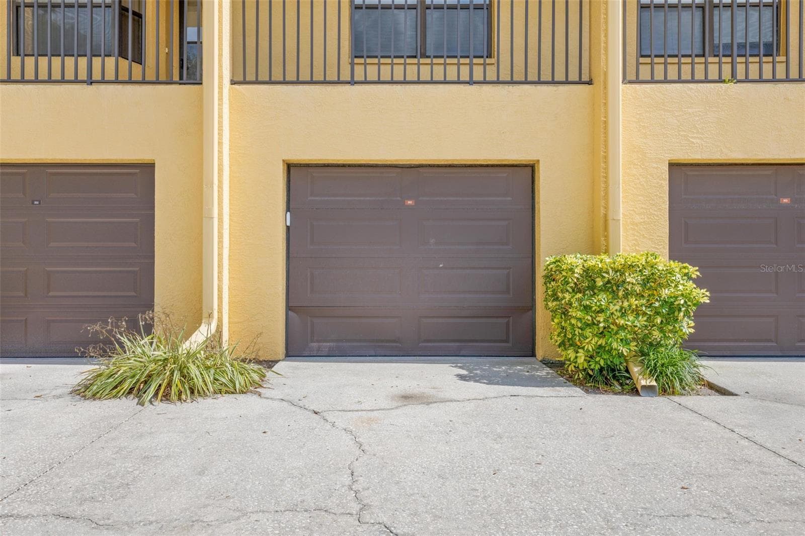 Under building GARAGE with secure entry to and from the building. - 5817 PARK ST N #302, ST PETERSBURG