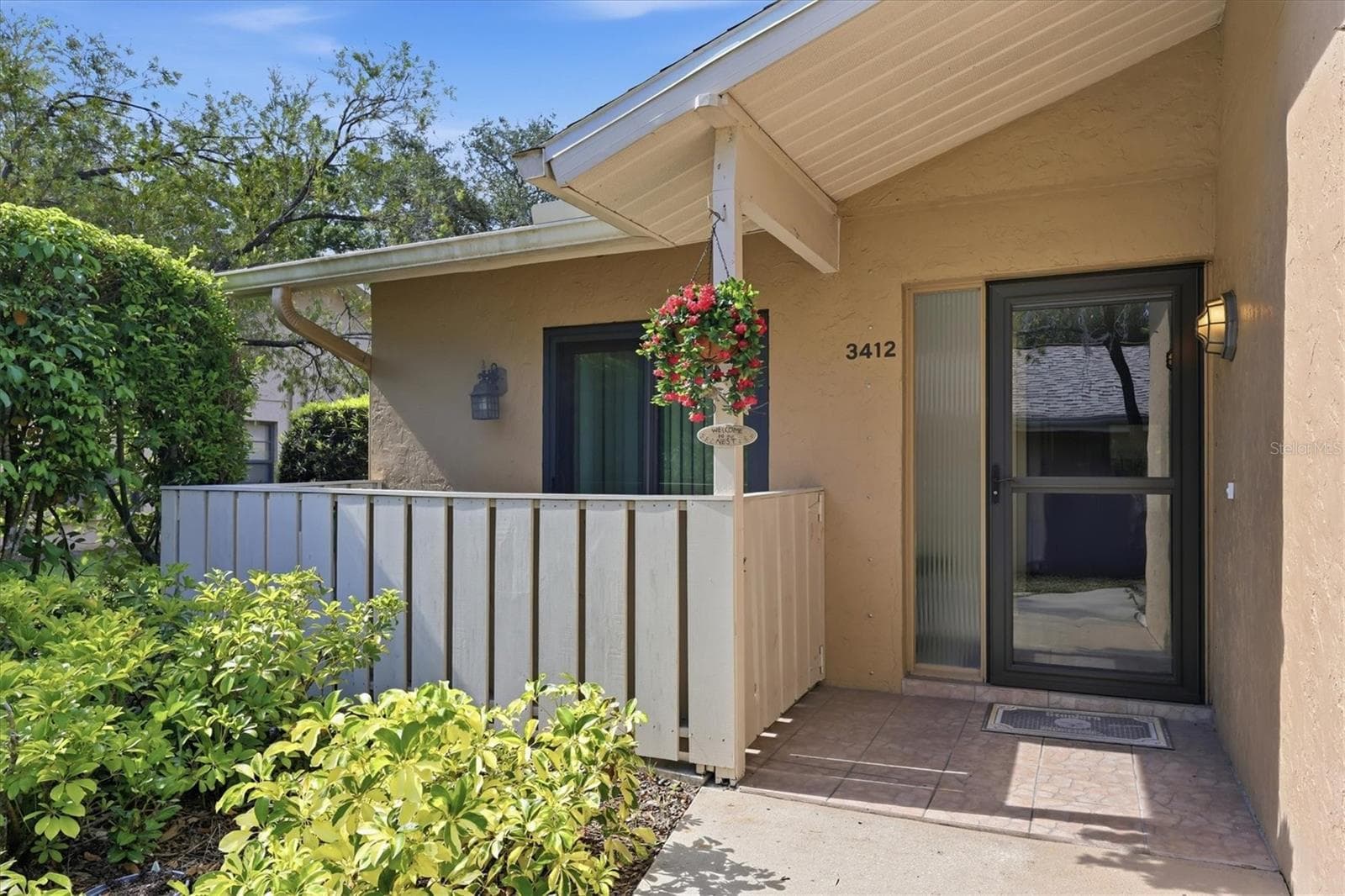Front Porch and fenced courtyard area for a grill - 3412 TALLYWOOD CIR #7018, SARASOTA
