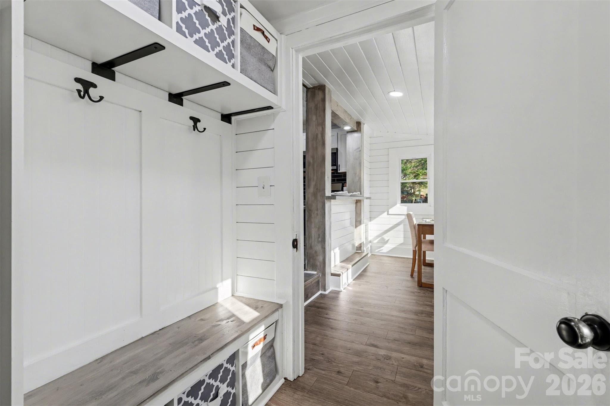 Utility room with a drop zone, leads from the new breakfast bar and back door entry area - 622 Neelys Creek Road, Rock Hill