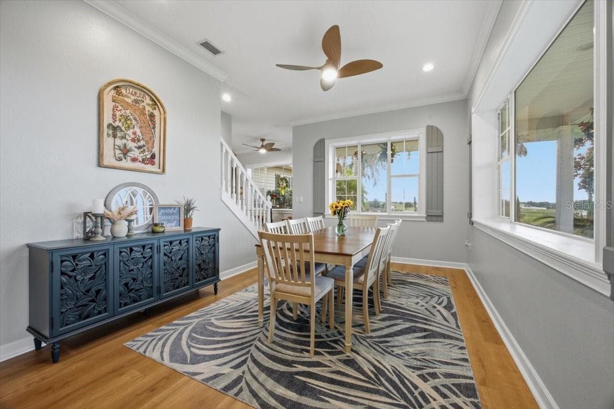Dining Room with great natural lighting & views of the property - 915 N CROOKED LAKE DR, BABSON PARK