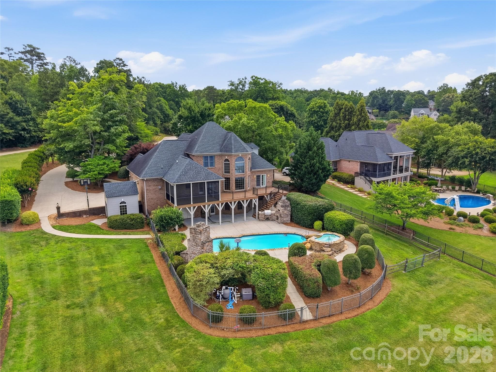 Screened porch, massive deck, outdoor kitchen, swimming pool, and out door fireplace - Belmont