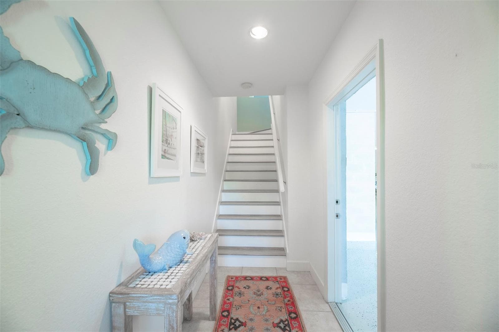 Stairs to the second floor living space - 10307 CORAL LANDINGS LN #11, PLACIDA