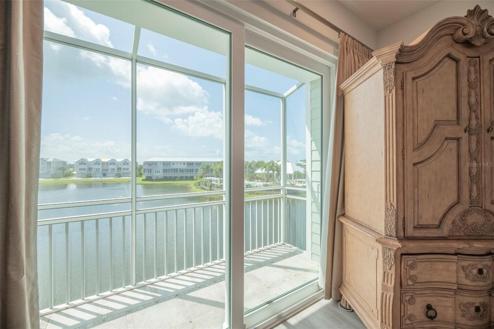 Third floor - primary bedroom lanai - 10307 CORAL LANDINGS LN #11, PLACIDA