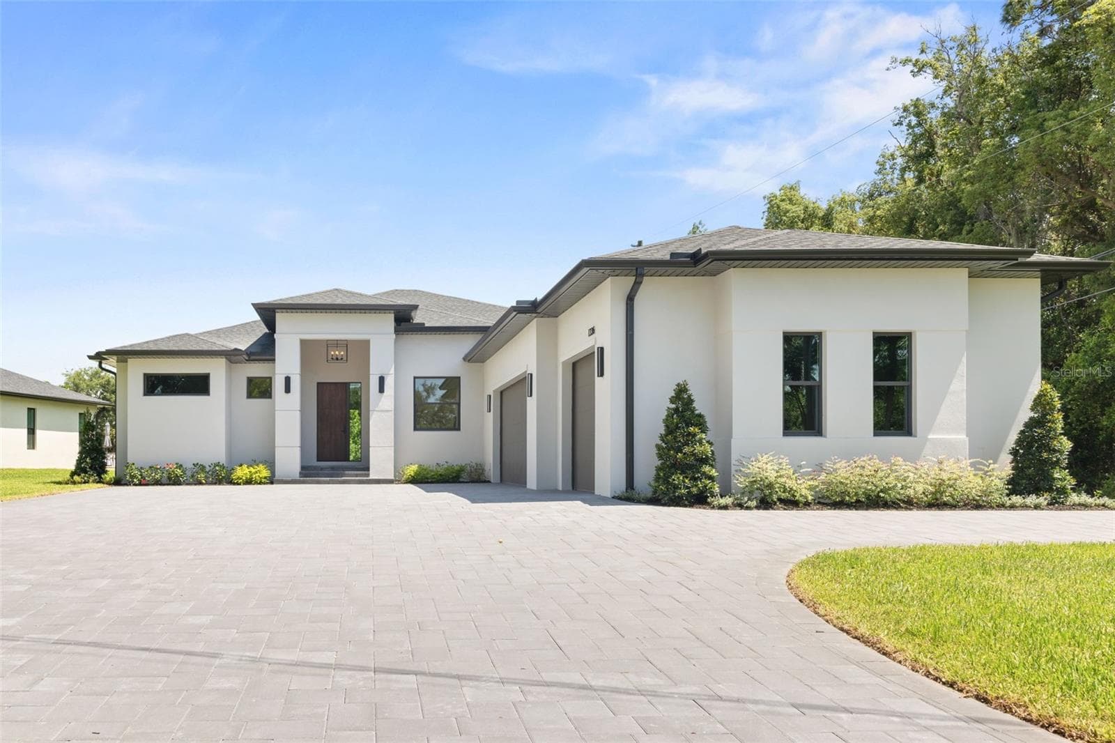 Welcome to this exceptional custom-built luxury residence, thoughtfully designed and constructed with top-rated materials, superior craftsmanship, and uncompromising attention to detail. - 1336 HAYS RD, TARPON SPRINGS