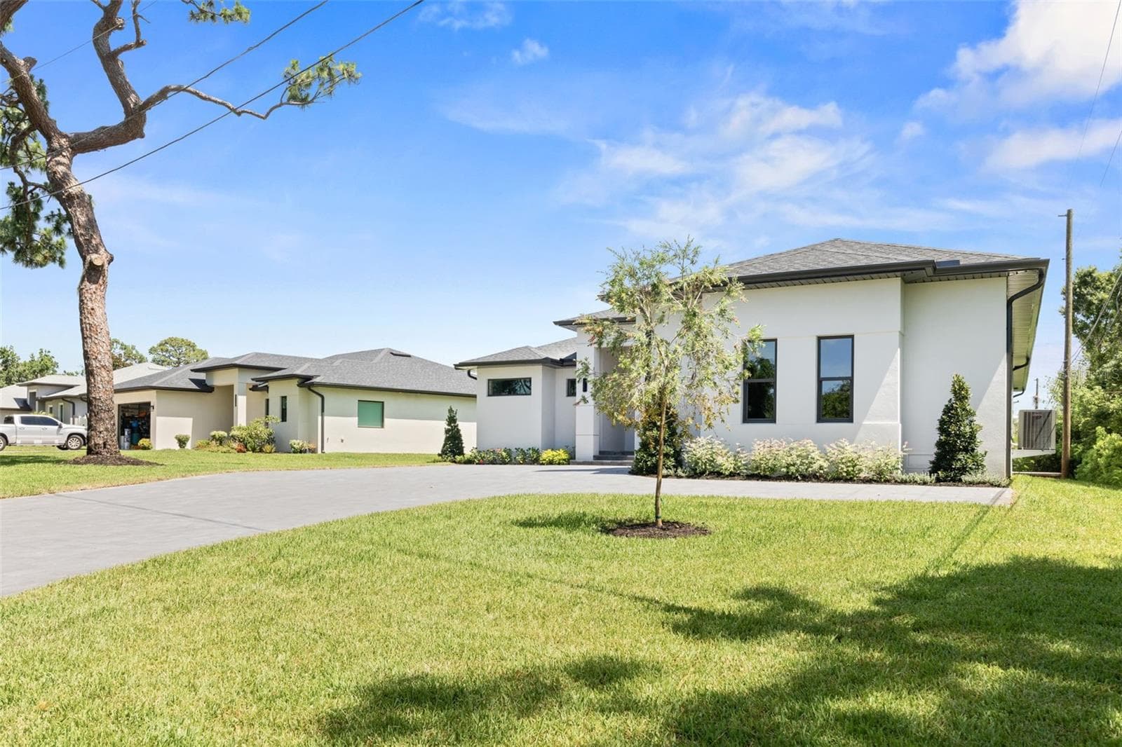 Welcome to this exceptional custom-built luxury residence, thoughtfully designed and constructed with top-rated materials, superior craftsmanship, and uncompromising attention to detail. - 1336 HAYS RD, TARPON SPRINGS