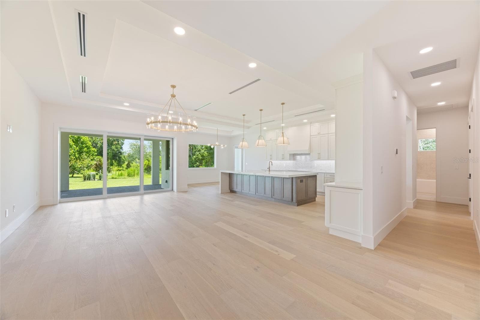 Living Room / Kitchen / Dining area. - 1336 HAYS RD, TARPON SPRINGS