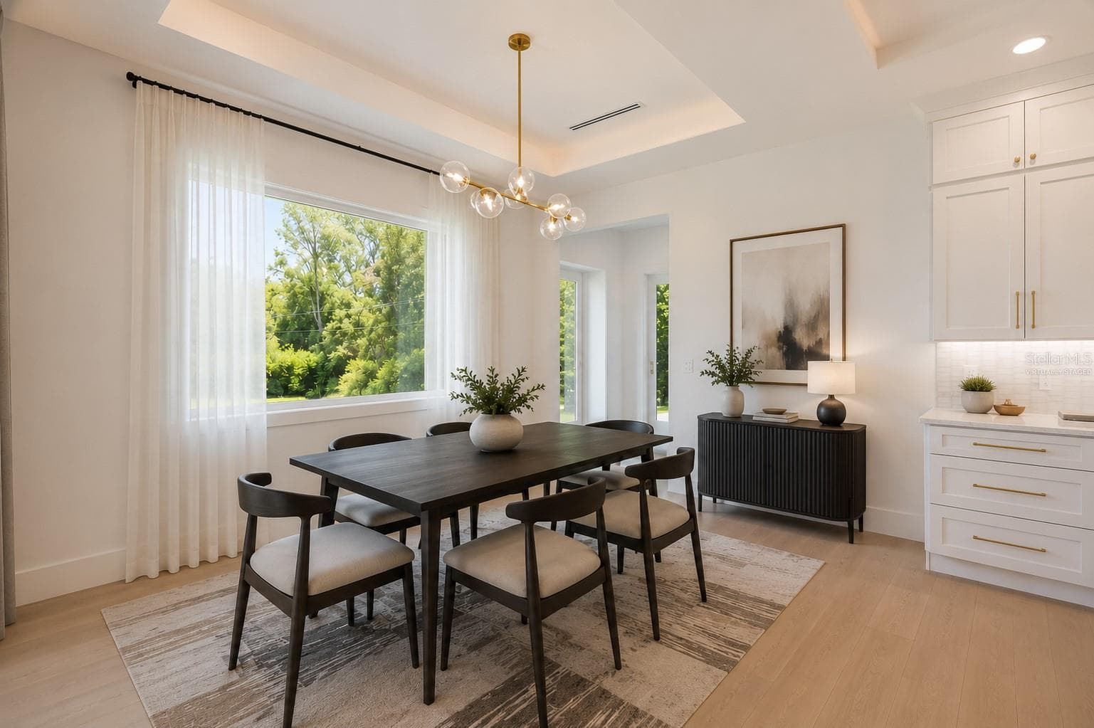 Virtually staged. Light and bright Dining area. - 1336 HAYS RD, TARPON SPRINGS