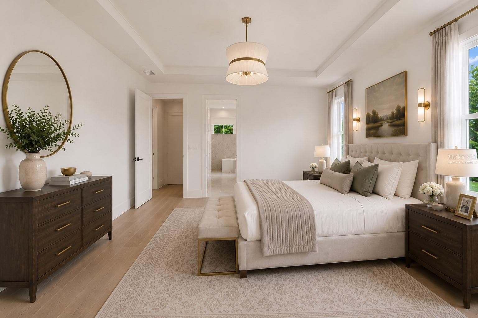 Virtually staged.The luxurious primary suite offers a spa-inspired retreat featuring a freestanding soaking tub, oversized walk-in shower with rain head and handheld shower, premium Italian tile, designer fixtures, and thoughtful custom details throughout. - 1336 HAYS RD, TARPON SPRINGS