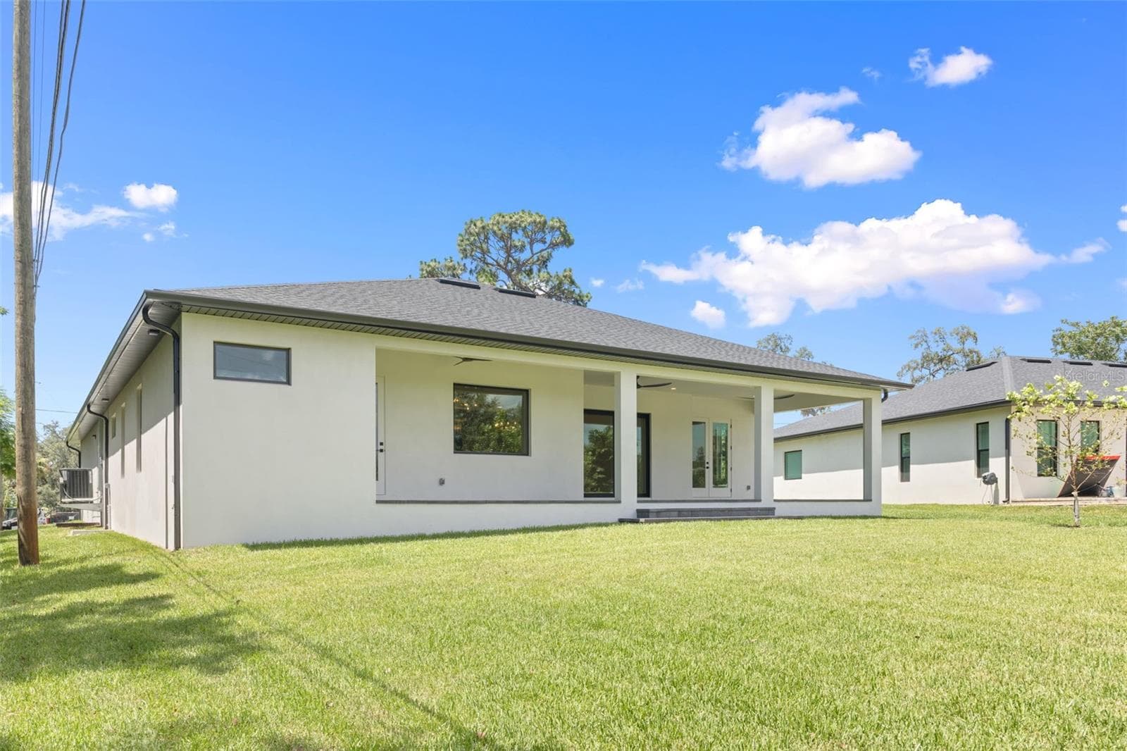The oversized homesite backing to a conservation area provides a rare combination of privacy, natural beauty, and room to enjoy Florida living at its finest. - 1336 HAYS RD, TARPON SPRINGS