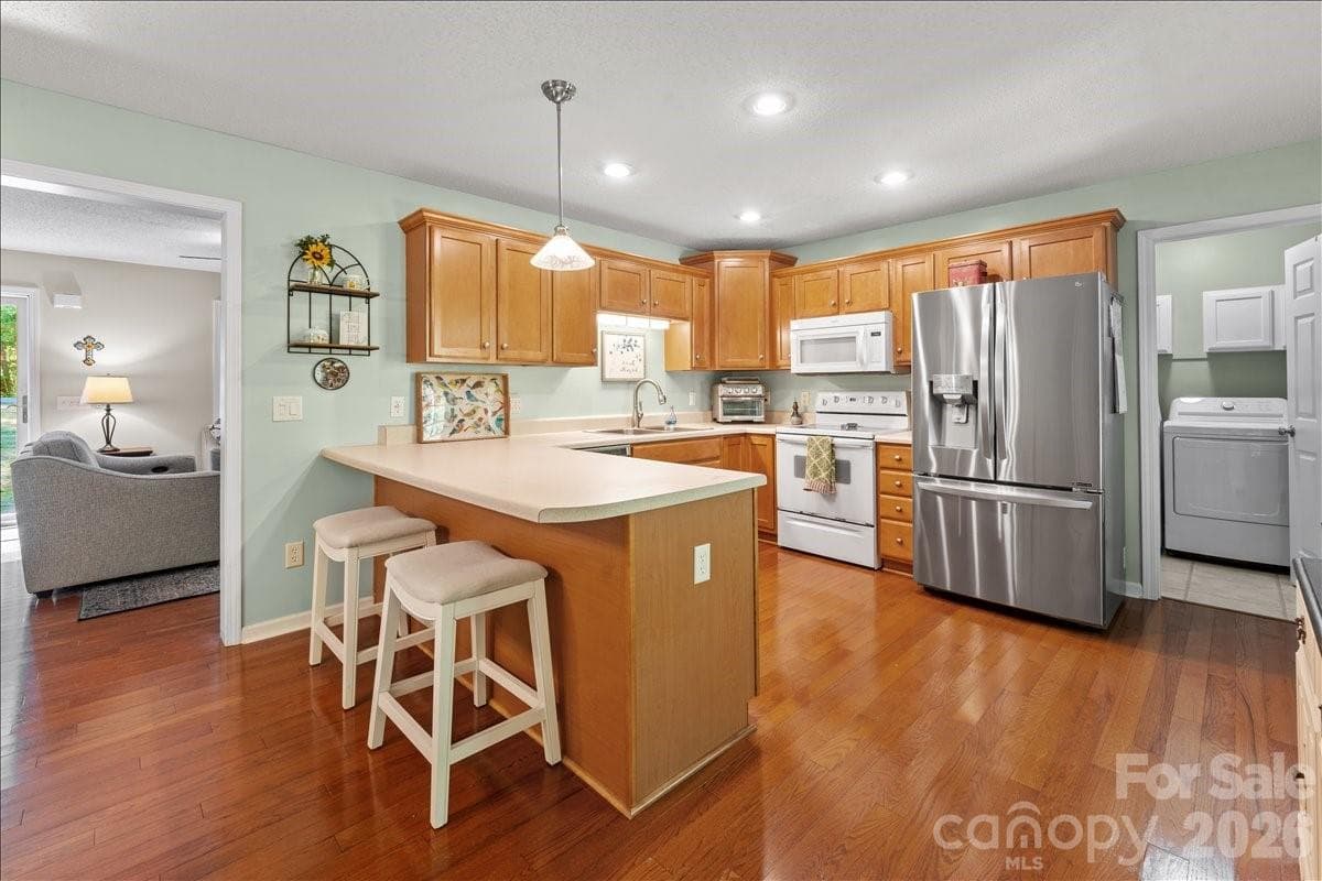 Plenty of soft close cabinets and a countertop extension for extra seating. - 104 Balsam Circle, Troy