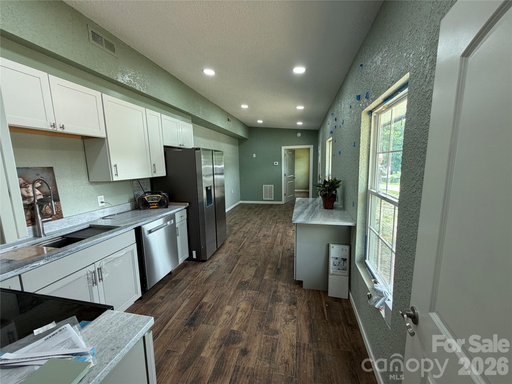 View of Kitchen, Dining and Living Room open floor plan. - 68 Circle Drive, Marion