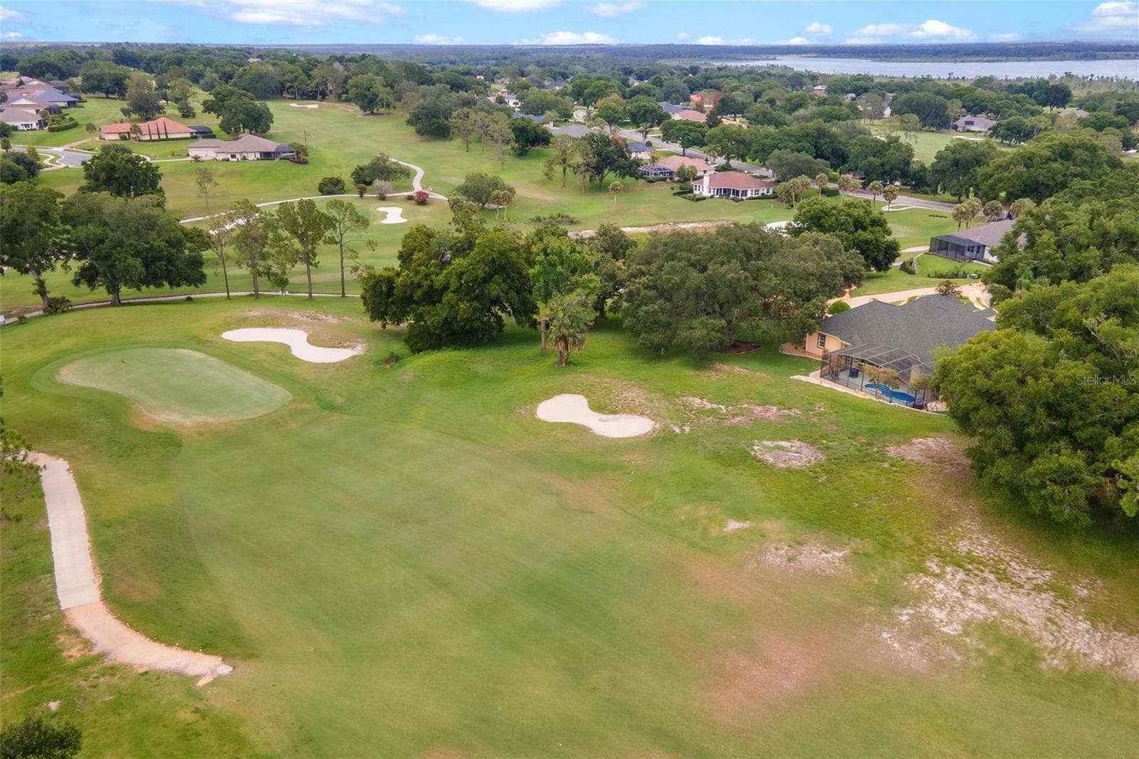 Aerial of Home on Golf Course - 5506 CITATION CT, LADY LAKE