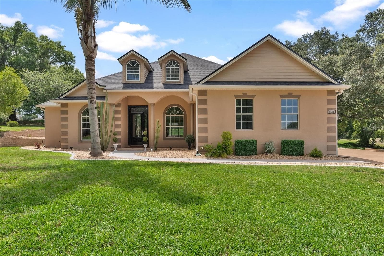 Welcoming Exterior Entry with Glass Door... - 5506 CITATION CT, LADY LAKE