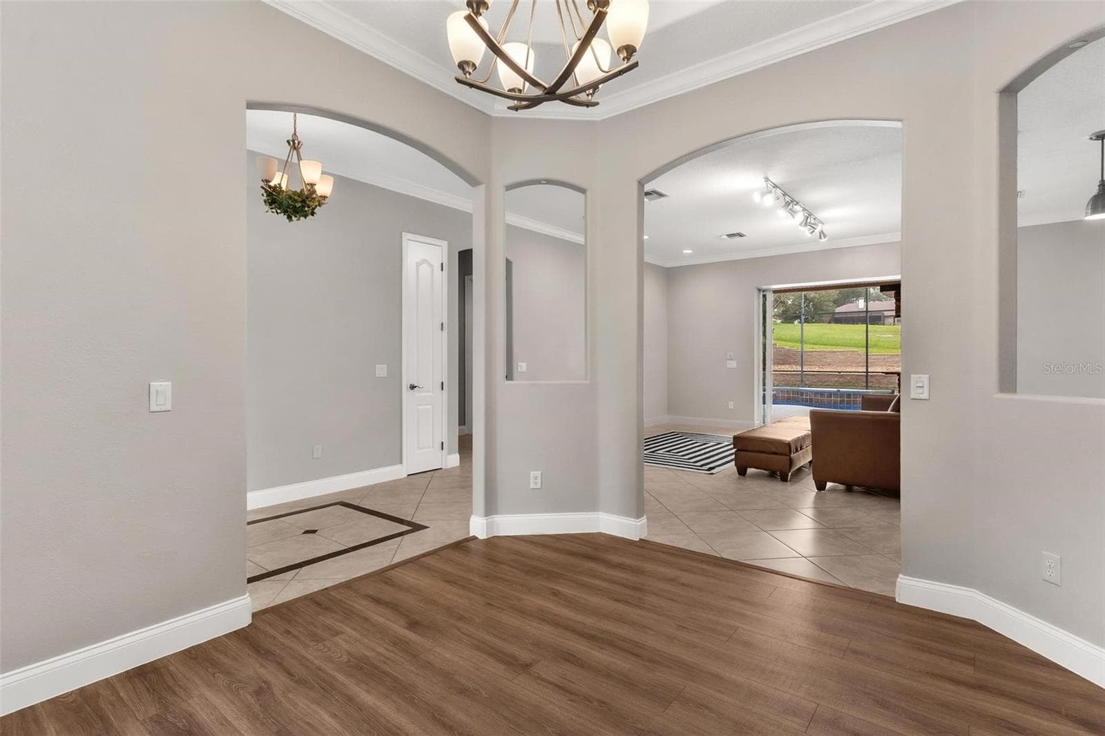 Great Room provides the perfect space for creating a cozy retreat - 5506 CITATION CT, LADY LAKE