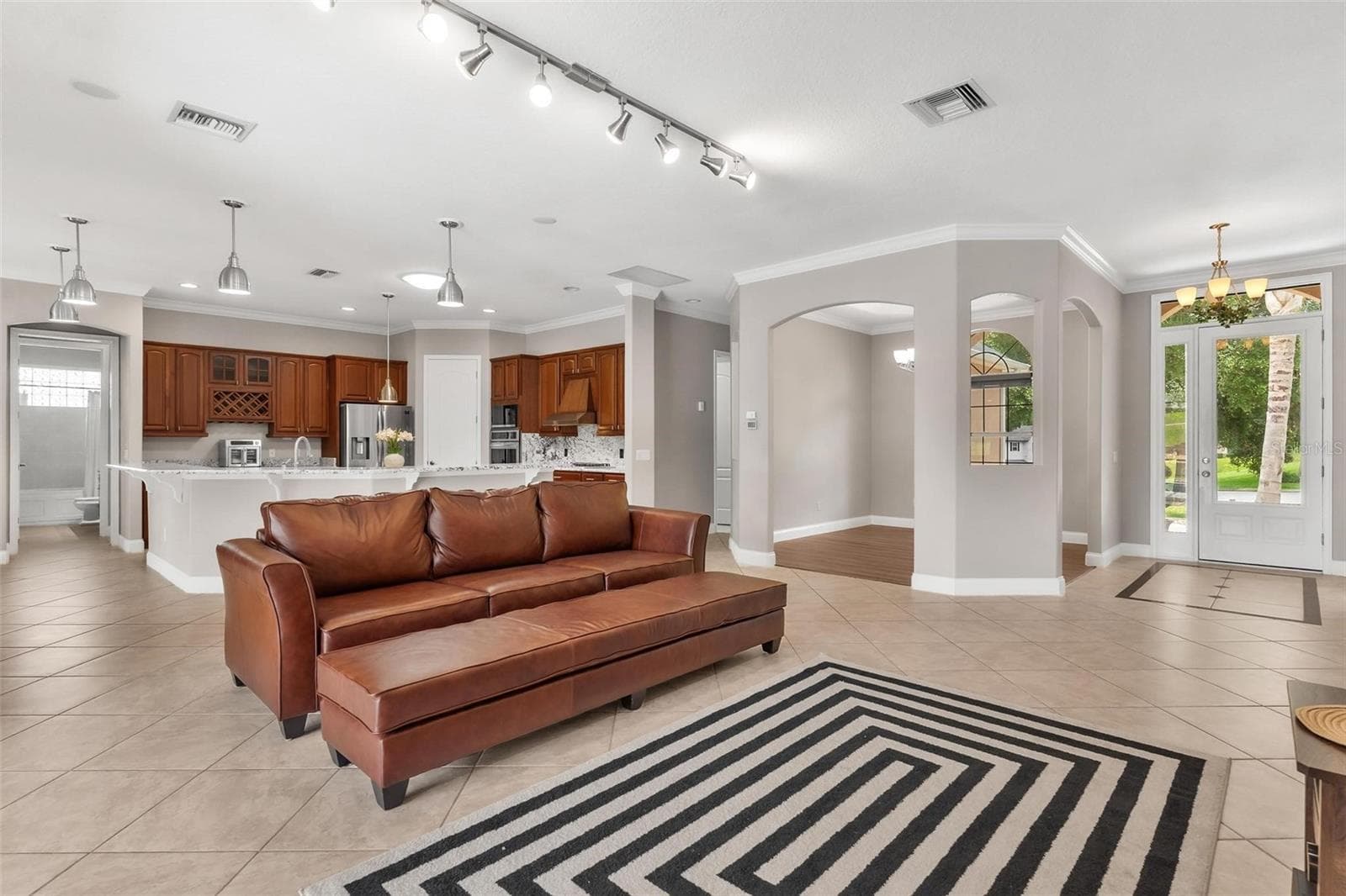 Living Area with Tile Floors - 5506 CITATION CT, LADY LAKE
