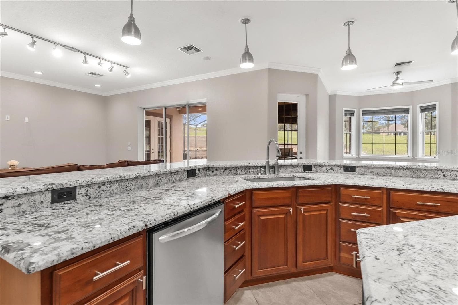 Kitchen Overlooks Living Area great for entertaining guest... - 5506 CITATION CT, LADY LAKE