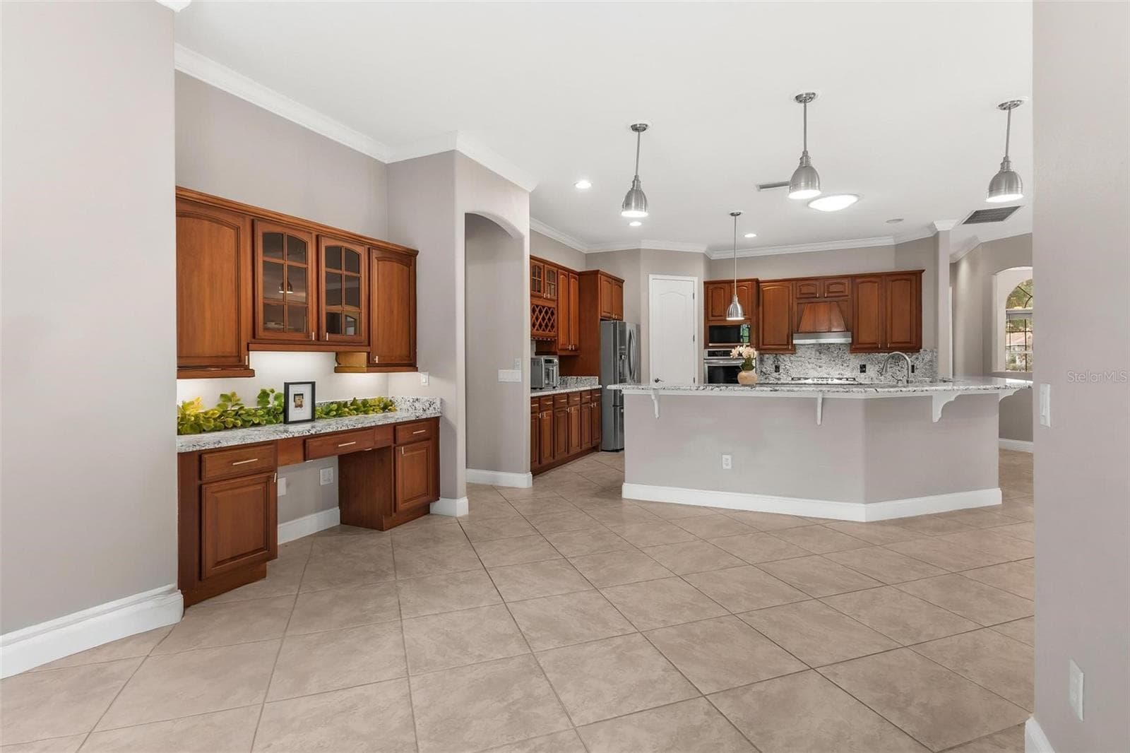 Built-In Desk Area perfect for looking up recipes... - 5506 CITATION CT, LADY LAKE