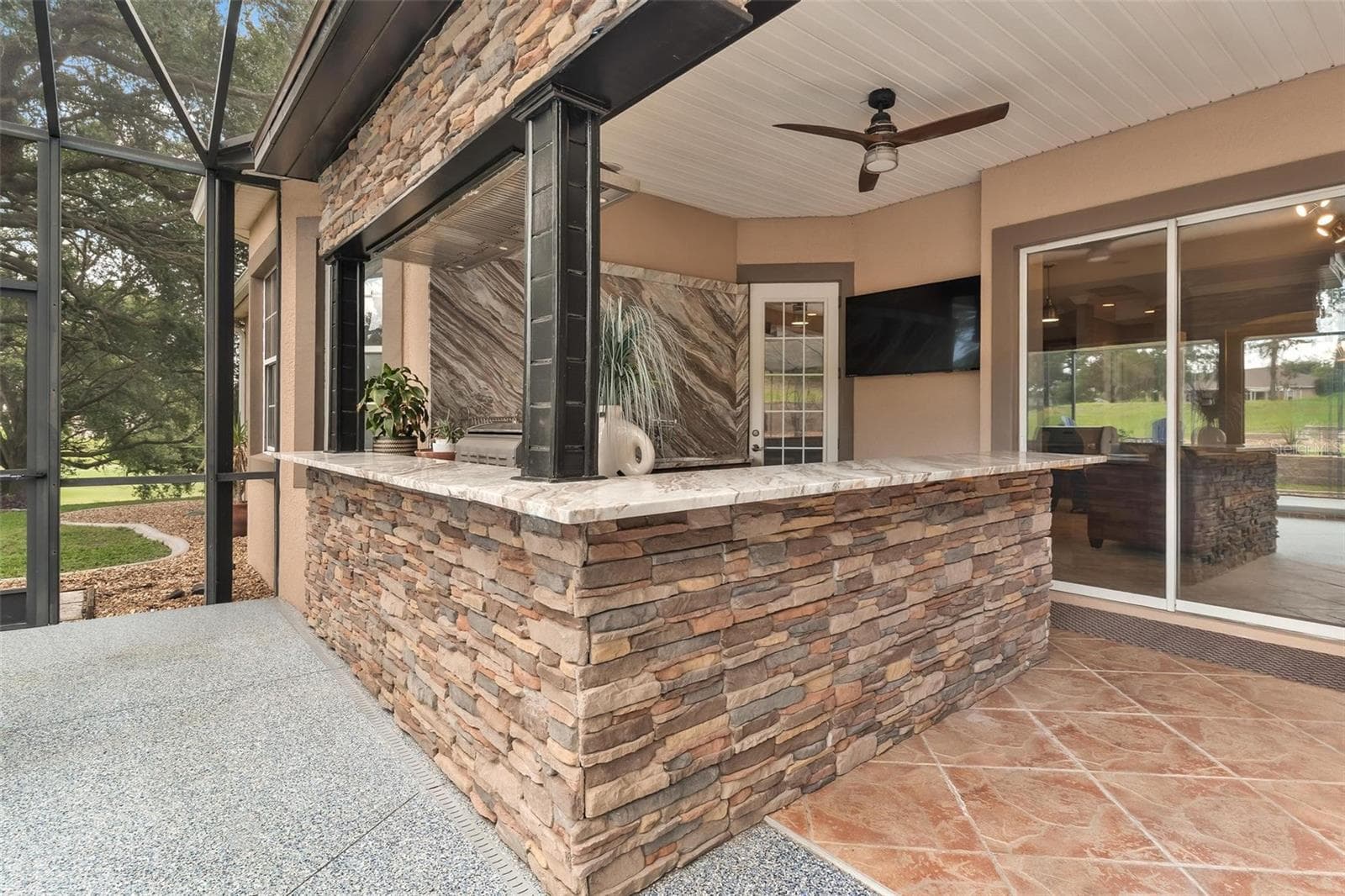 Glass Sliders to Living Room from Pool Area - 5506 CITATION CT, LADY LAKE