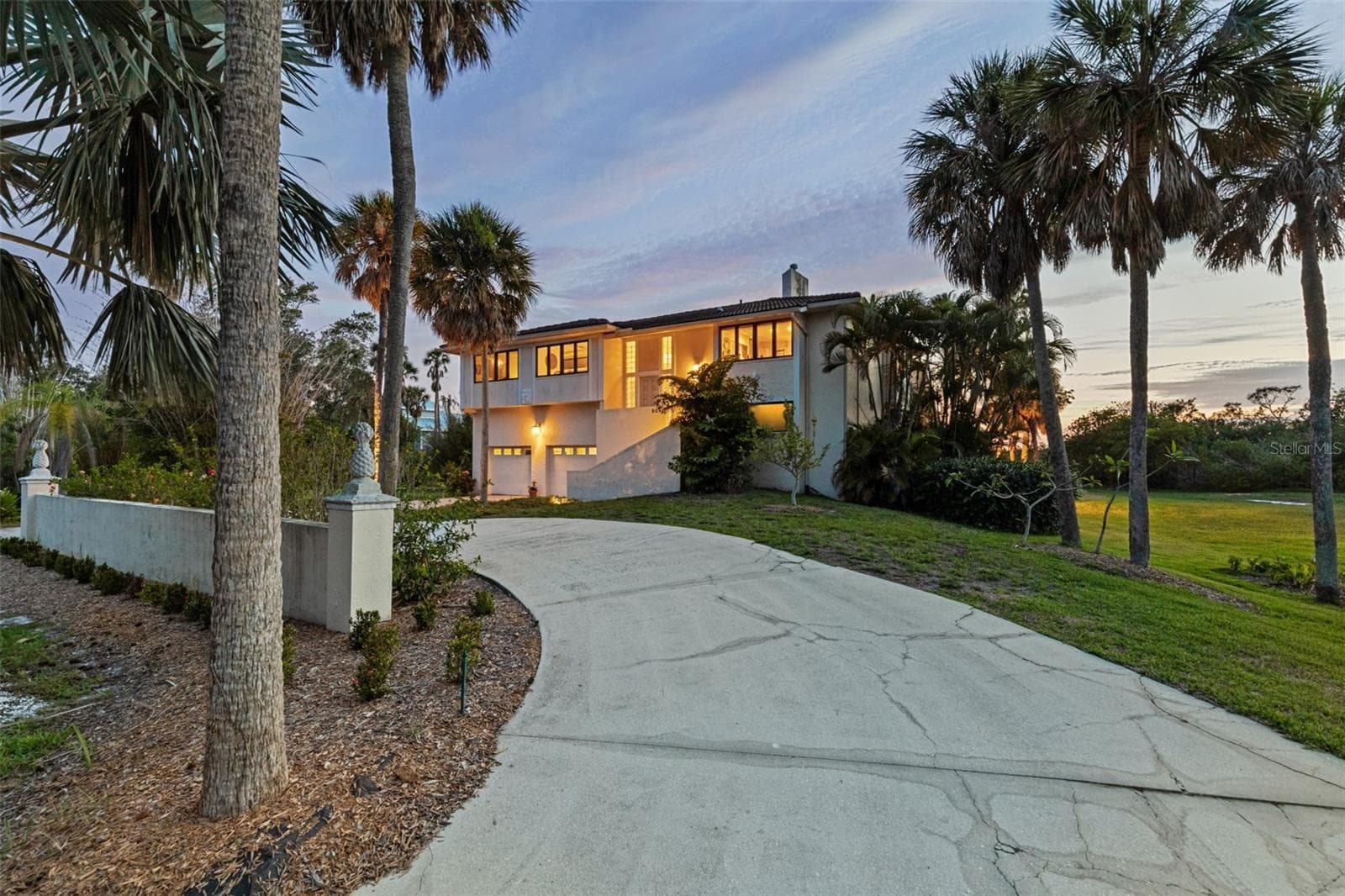 Twilight view which shows circular drive.    This is a have to see in person home. - 609 42ND STREET CT W, PALMETTO