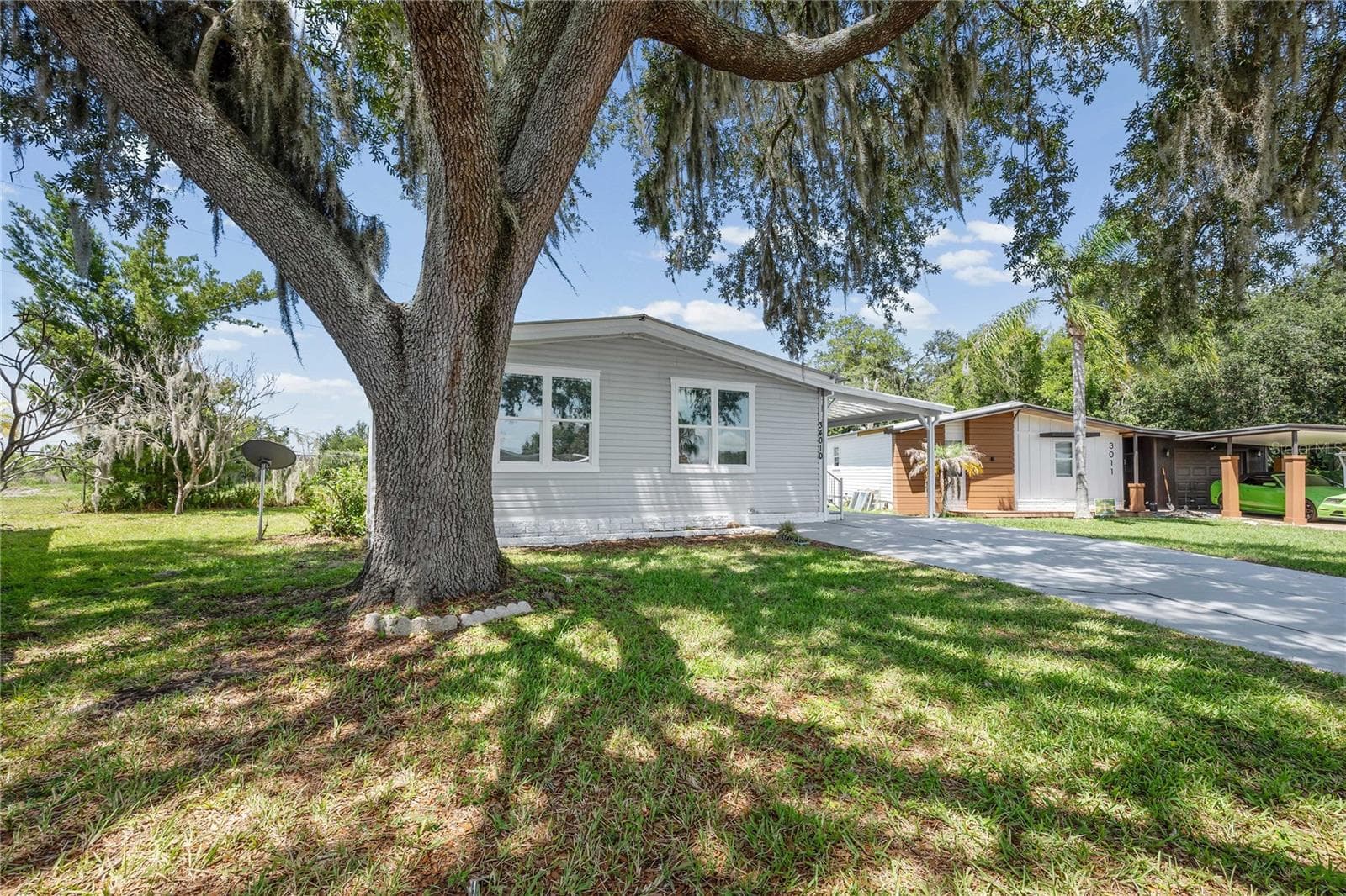 Manufactured Home at 34010 ESTATES LN, WESLEY CHAPEL, photo 3 of 33