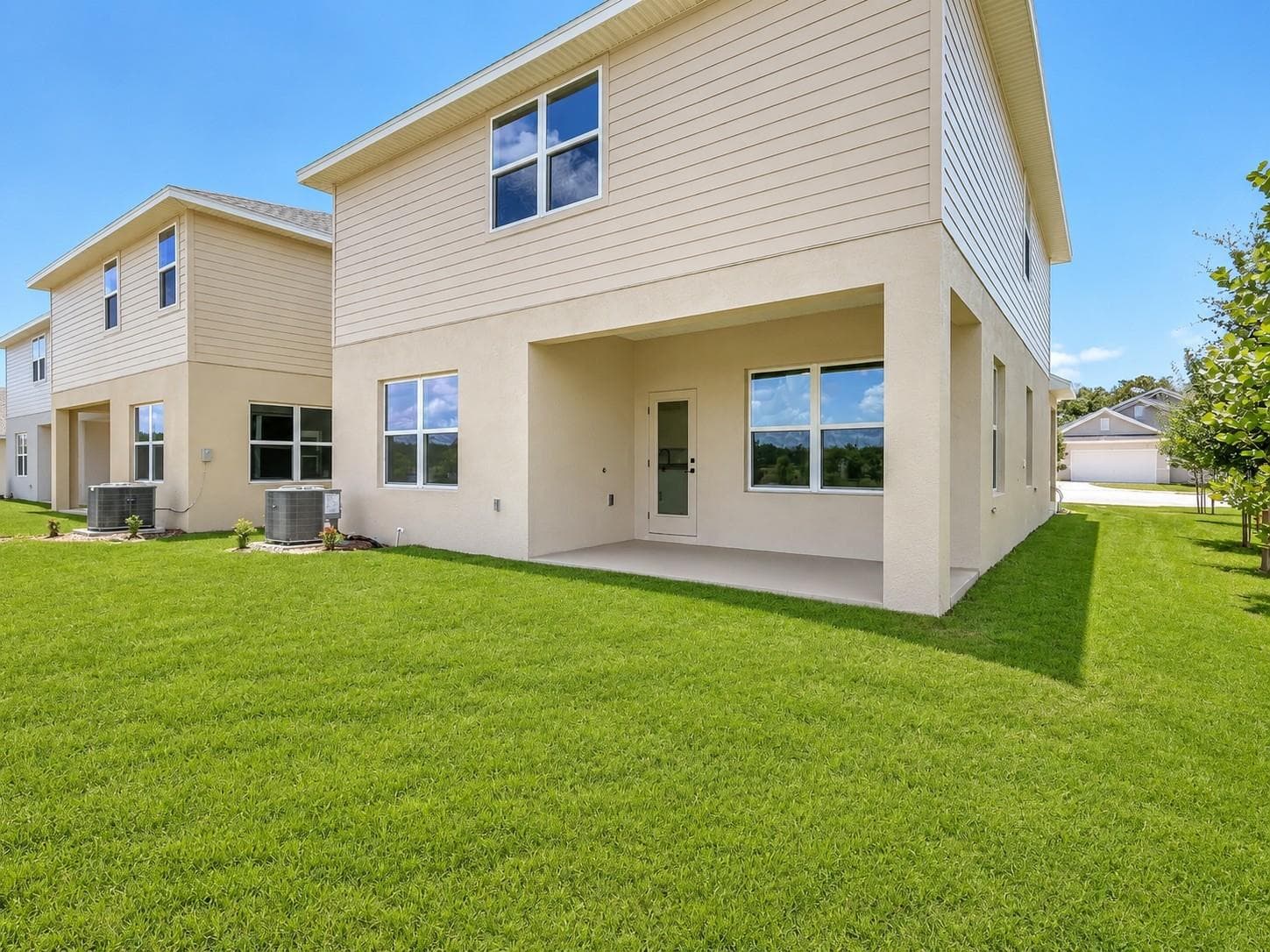 Rear Exterior and Backyard - 7587 BENT TREE LOOP, ST CLOUD