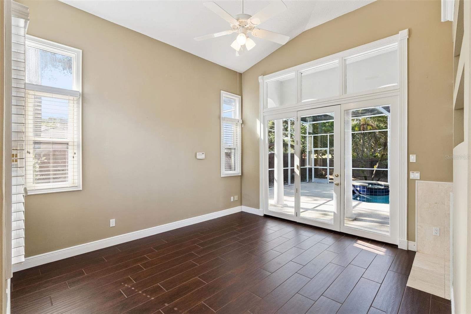 Living Room w/  Fireplace & built-in Bookcase - 1250 E LANGLEY CT, LAKE MARY