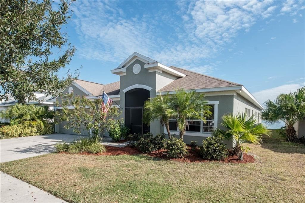 This house sits on a looped street in a gorgeous gated community with very little traffic - 1742 MIRA LAGO CIR, RUSKIN