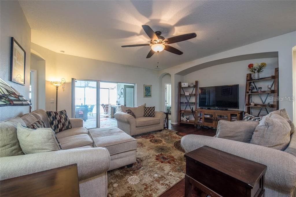 The living space is open and offers water views - 1742 MIRA LAGO CIR, RUSKIN
