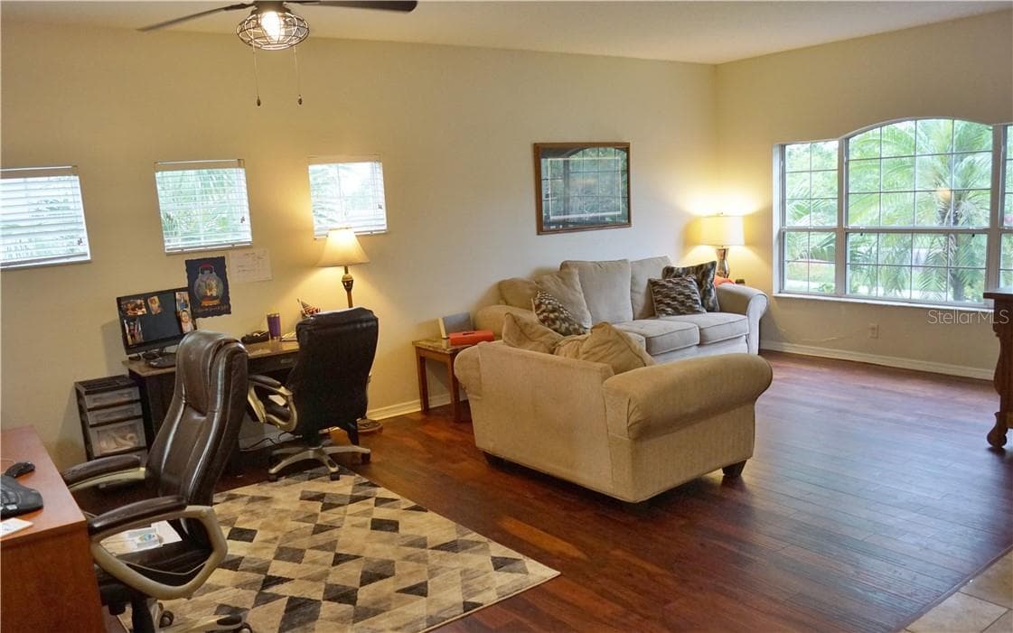 This huge front room can be used many ways and looks out at conservation - 1742 MIRA LAGO CIR, RUSKIN