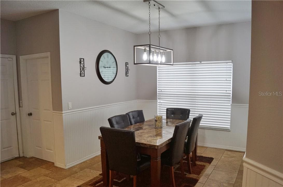 Dining space in kitchen with updated lighting - 1742 MIRA LAGO CIR, RUSKIN