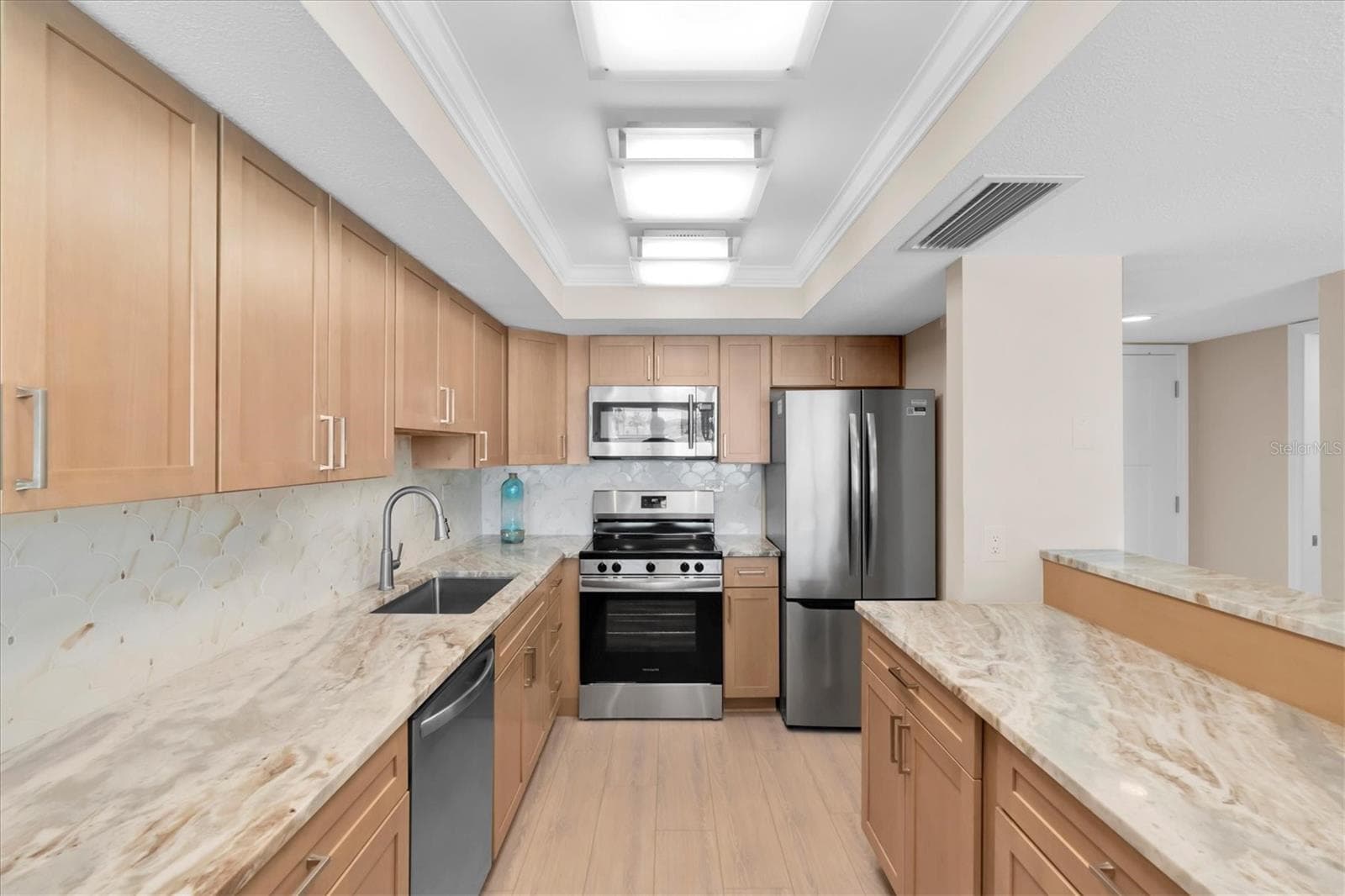 Kitchen w/solid wood cabintry soft close features/level 4  Granite - 450 TREASURE ISLAND CSWY #102, TREASURE ISLAND