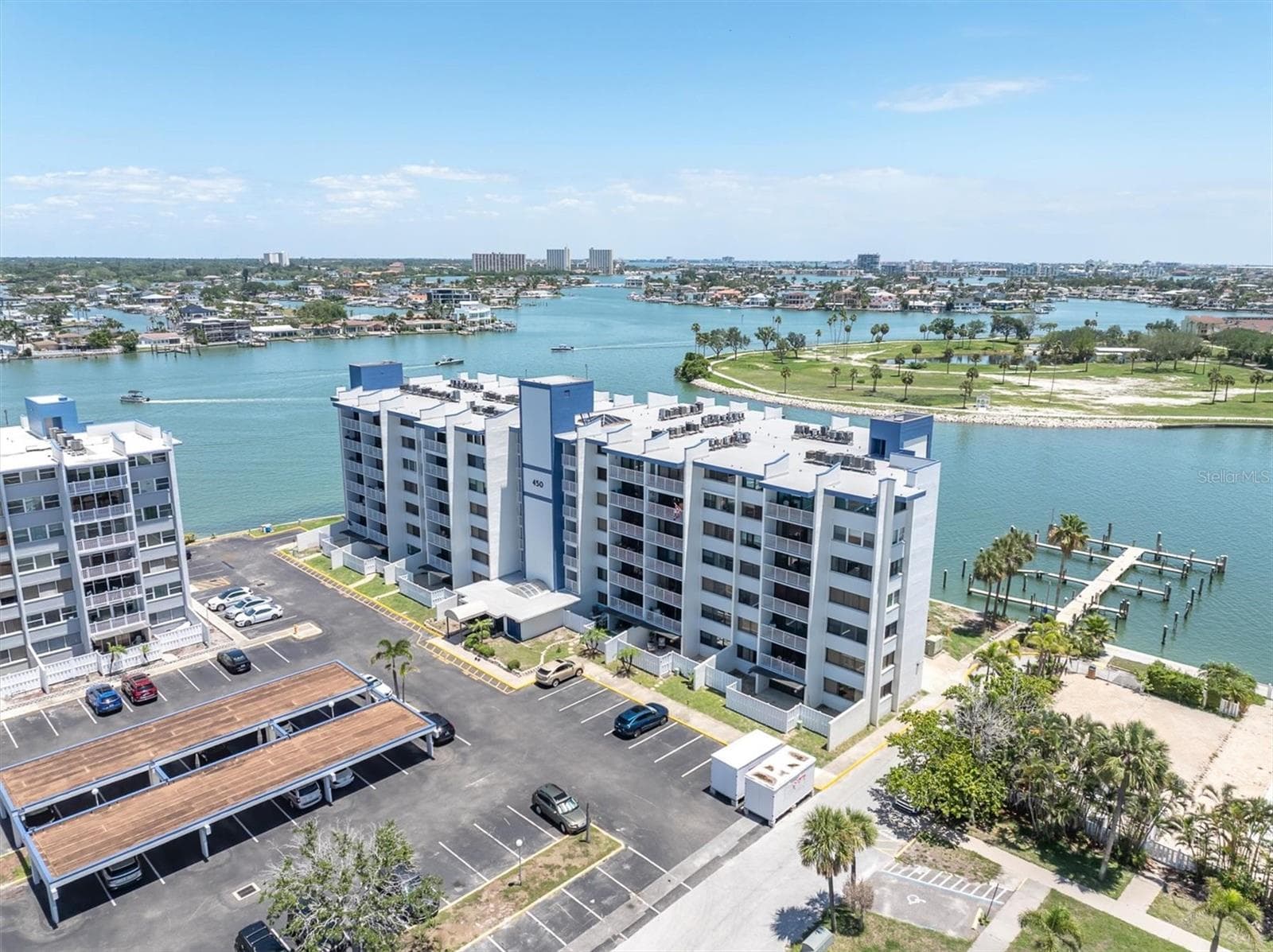 Southeast view new 24 slip yacht club next door - 450 TREASURE ISLAND CSWY #102, TREASURE ISLAND