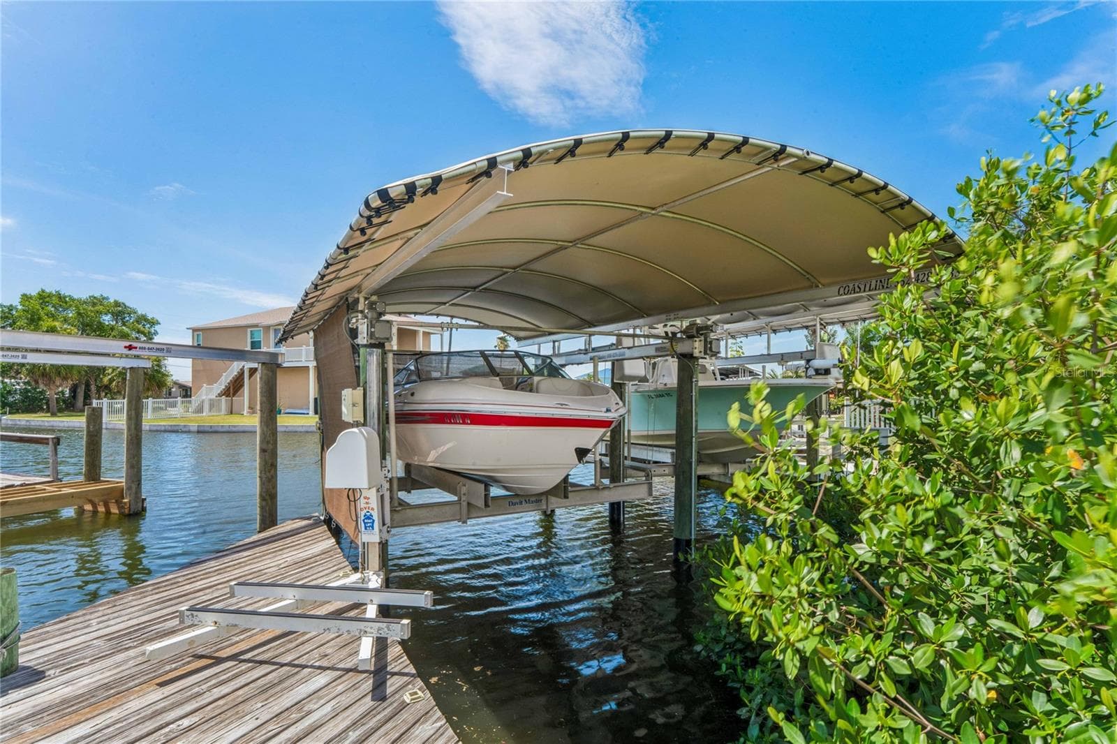 12000 LB. BOAT LIFT AND COVER - 6641 BOATYARD DR, HUDSON