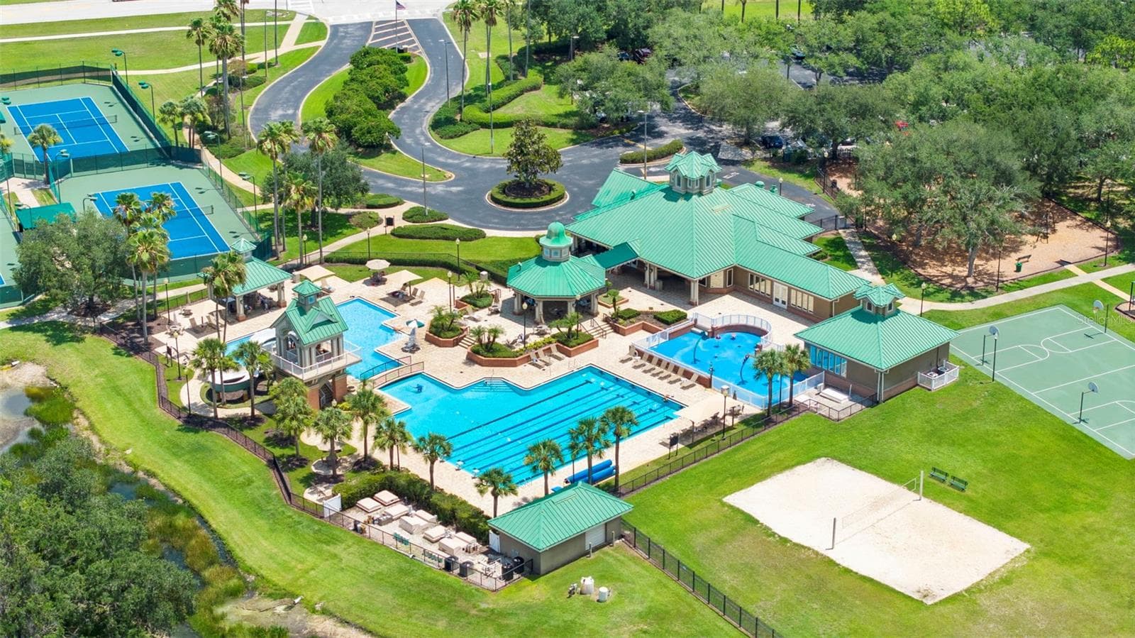 West Meadows amenity center: 4 tennis courts, lap pool, resort style pool, clubhouse, basketball courts, sand volleyball court, playground - 8380 GOLDEN PRAIRIE DR, TAMPA