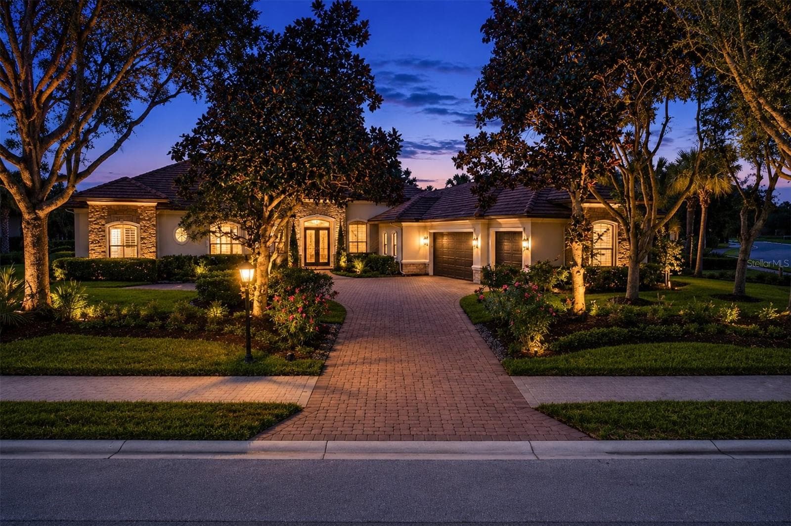 Front View at Twilight - 9261 MCDANIEL LN, SARASOTA