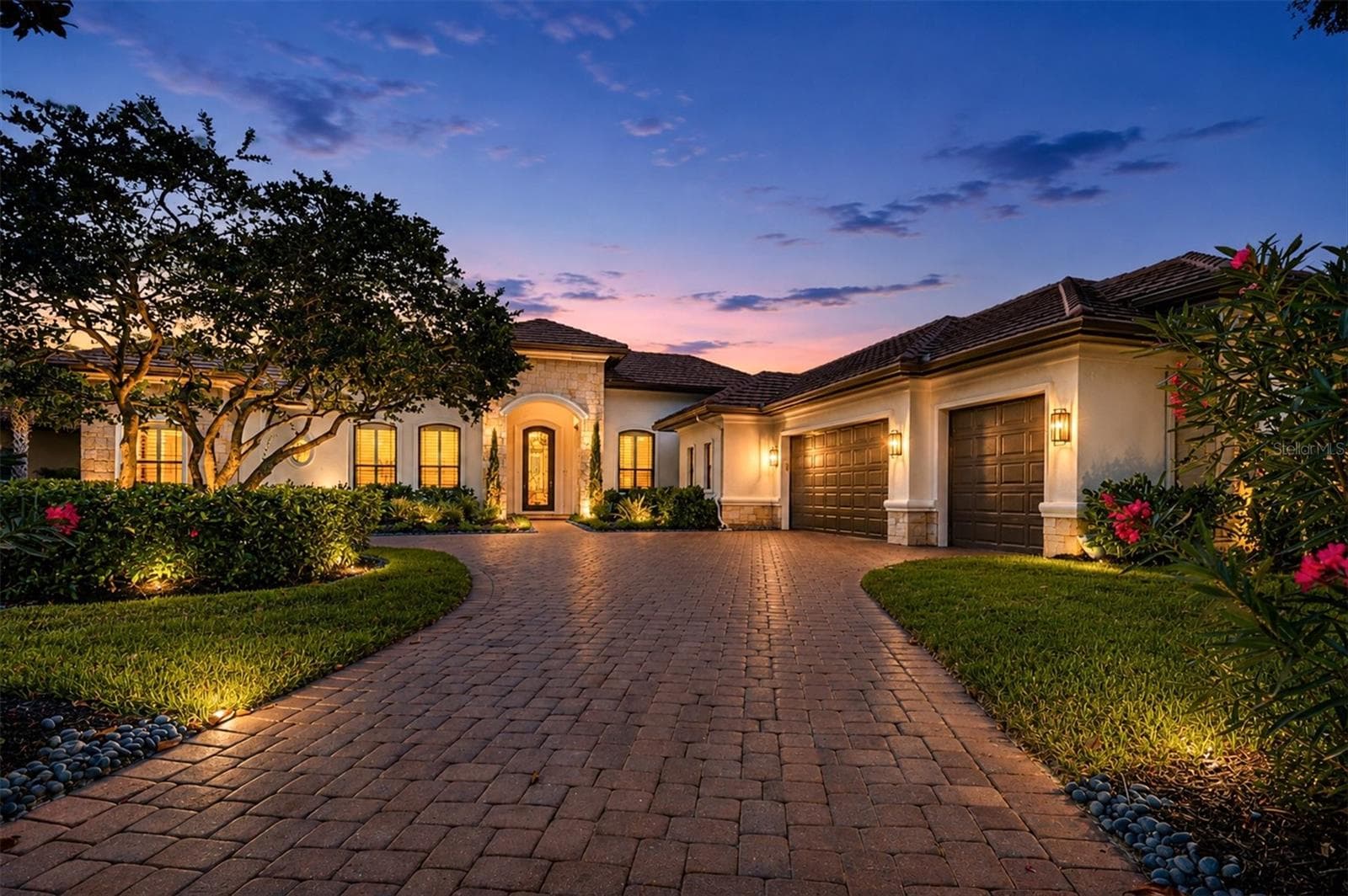 Front View at Twilight - 9261 MCDANIEL LN, SARASOTA