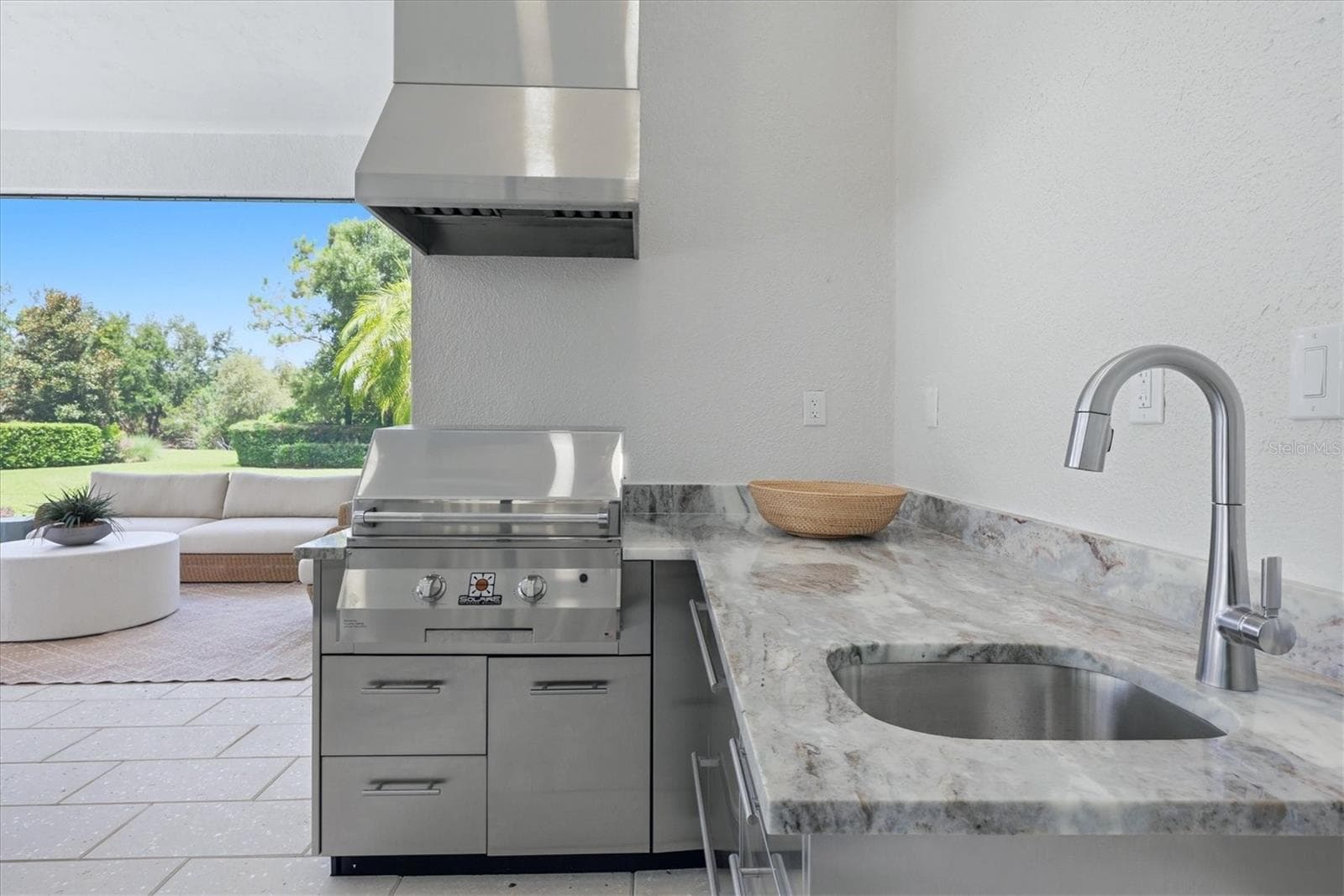 Outdoor kitchen with new gas grill - 9261 MCDANIEL LN, SARASOTA