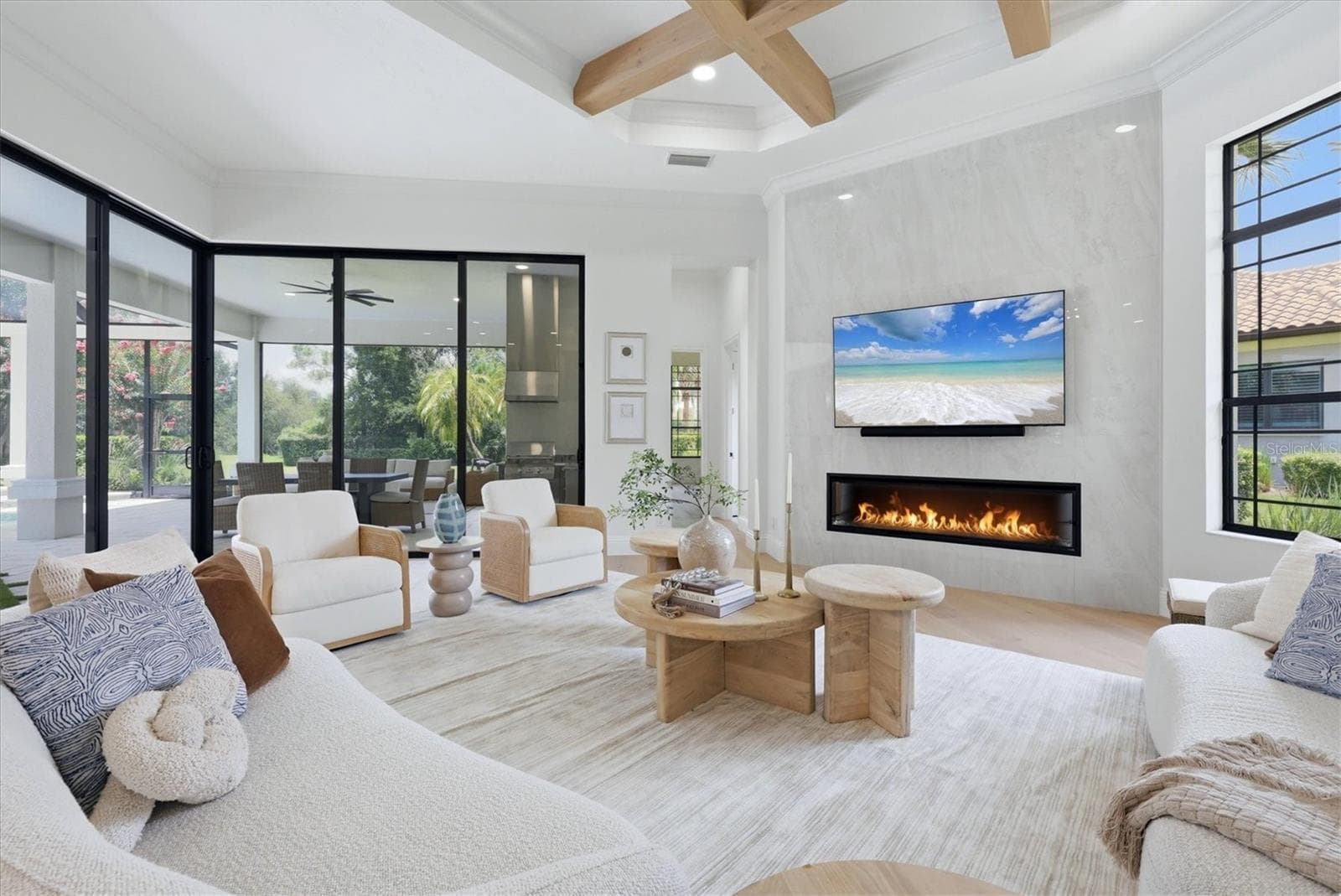 family room with new feature wall - 9261 MCDANIEL LN, SARASOTA