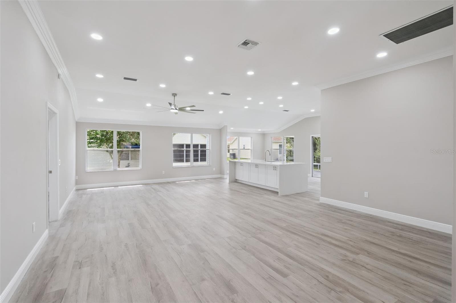 Living Room and Kitchen with Inset LED Lighting - 1506 DELLANO WAY, THE VILLAGES