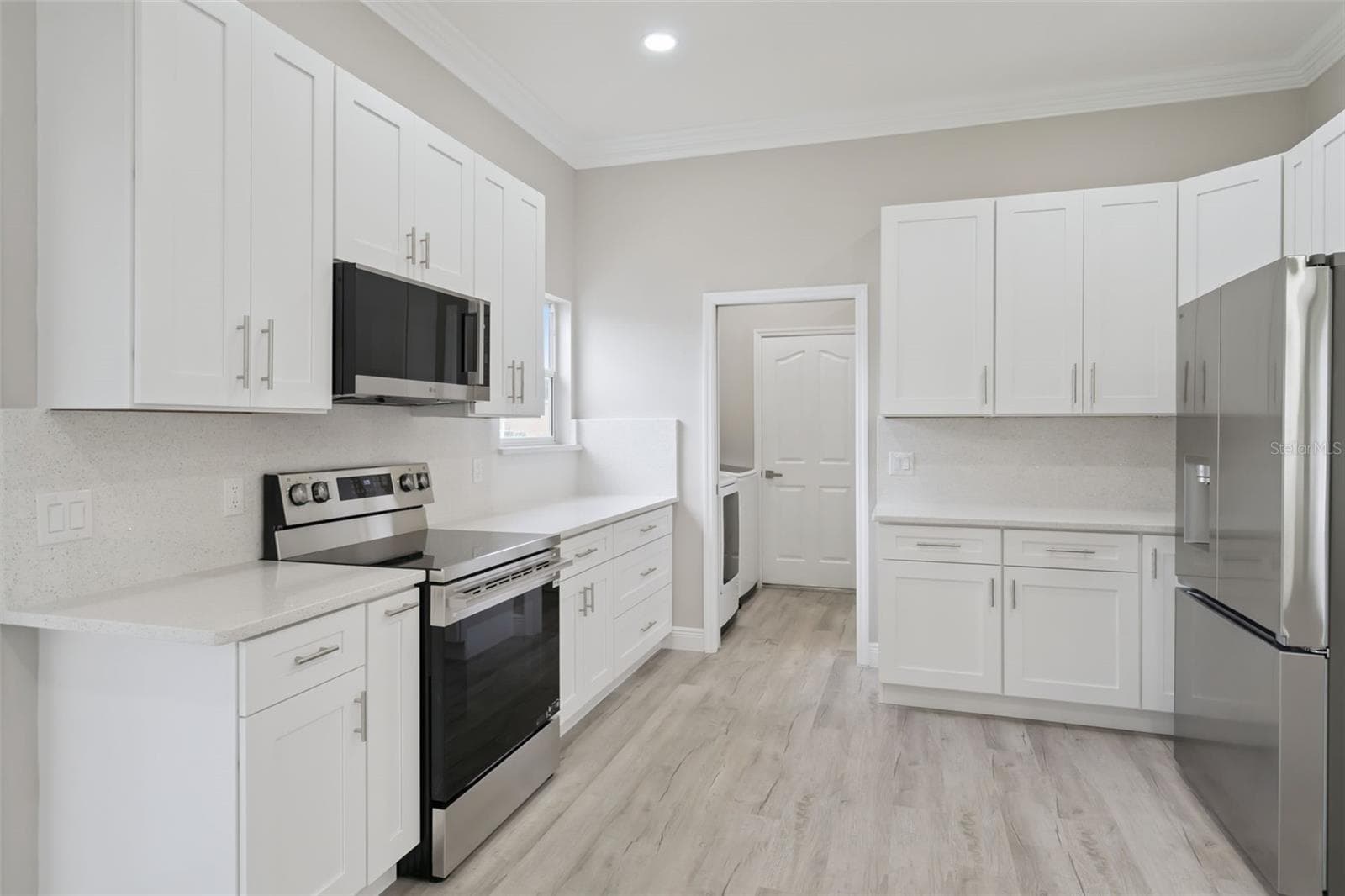 GE Stainless steel appliances and quartz countertops - 1506 DELLANO WAY, THE VILLAGES