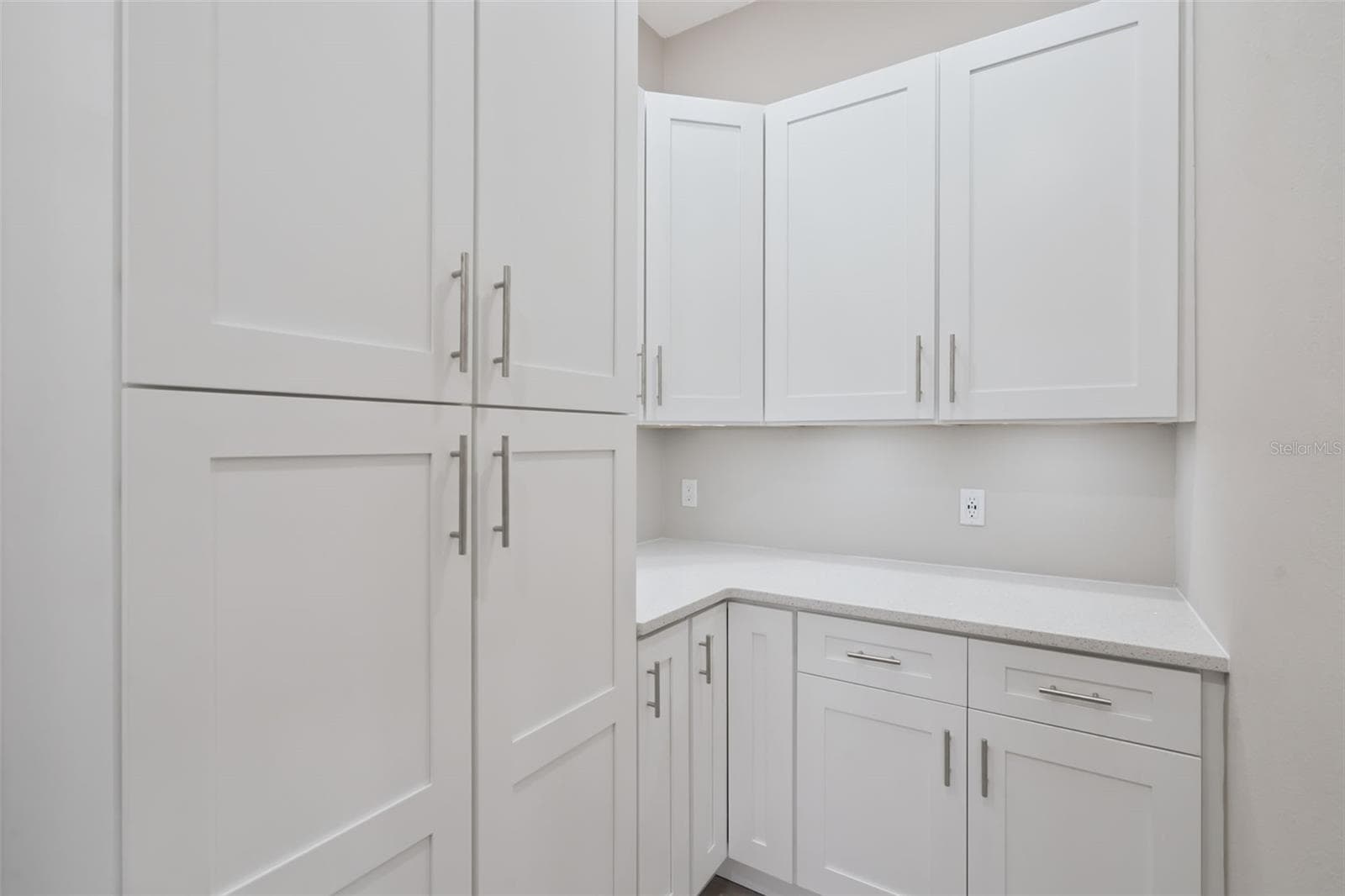 Butler's Pantry with Custom Pantry cabinets, Quartz Countertops and senor under cabinet lighting - 1506 DELLANO WAY, THE VILLAGES