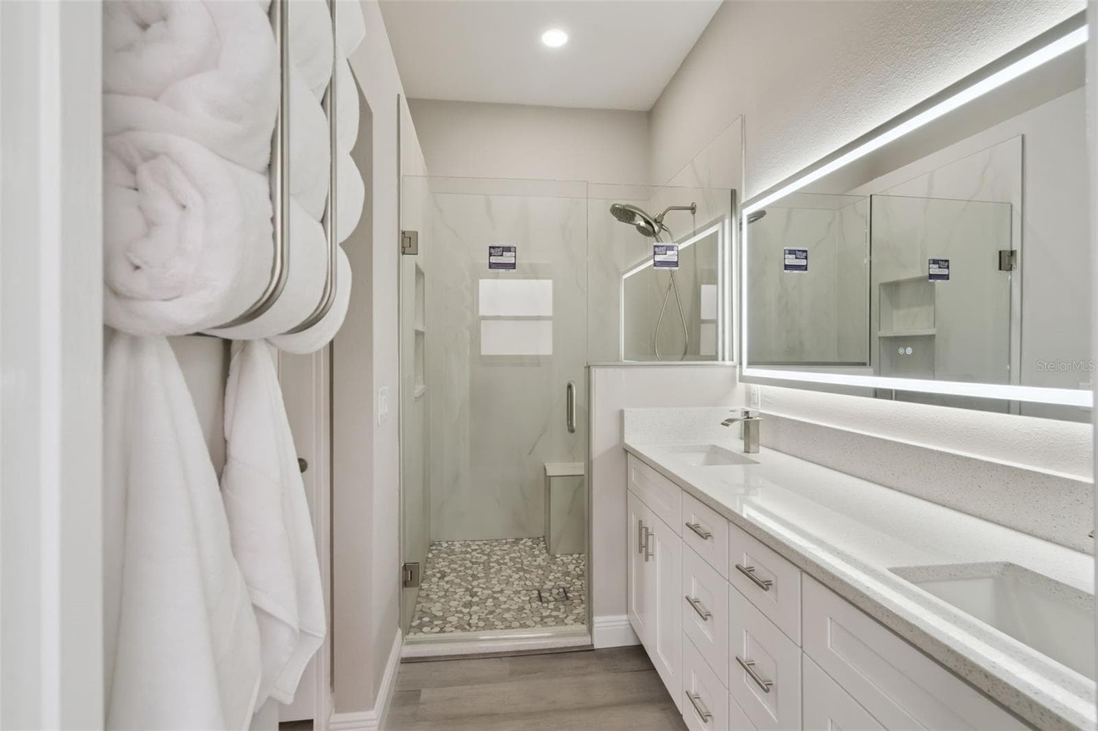 Primary ensuite with double vanities and walk-in shower - 1506 DELLANO WAY, THE VILLAGES