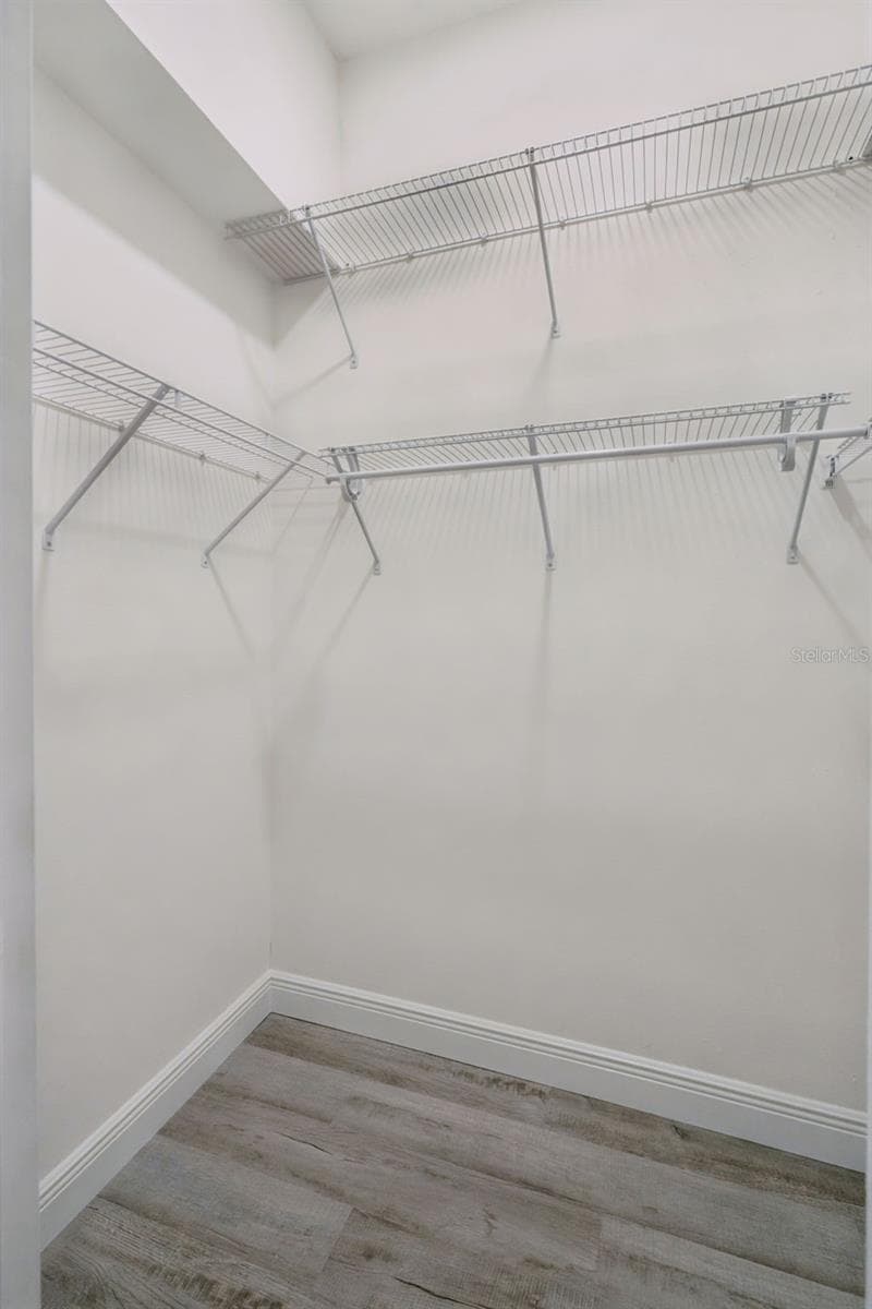 One of the Two Primary Walk-In Closet - 1506 DELLANO WAY, THE VILLAGES