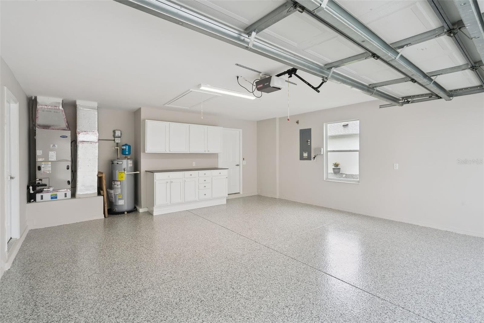 Two Car Garage with Polyaspartic Flooring - 1506 DELLANO WAY, THE VILLAGES