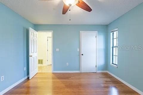 Guest bedroom - 7528 RIVER COUNTRY DR, WEEKI WACHEE