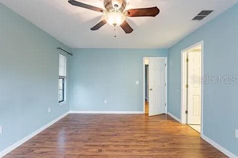 Primary Bedroom - 7528 RIVER COUNTRY DR, WEEKI WACHEE