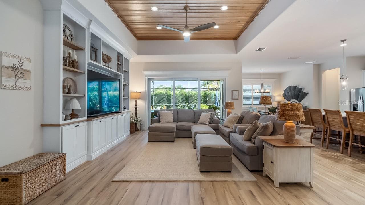 Oak Bookcase offers a striking focal point - 4008 PINNACLE PLACE CT, LADY LAKE