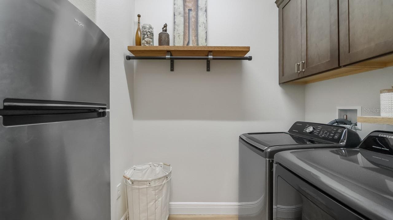Laundry Room with Cabinetry and 2nd Refrigerator - 4008 PINNACLE PLACE CT, LADY LAKE