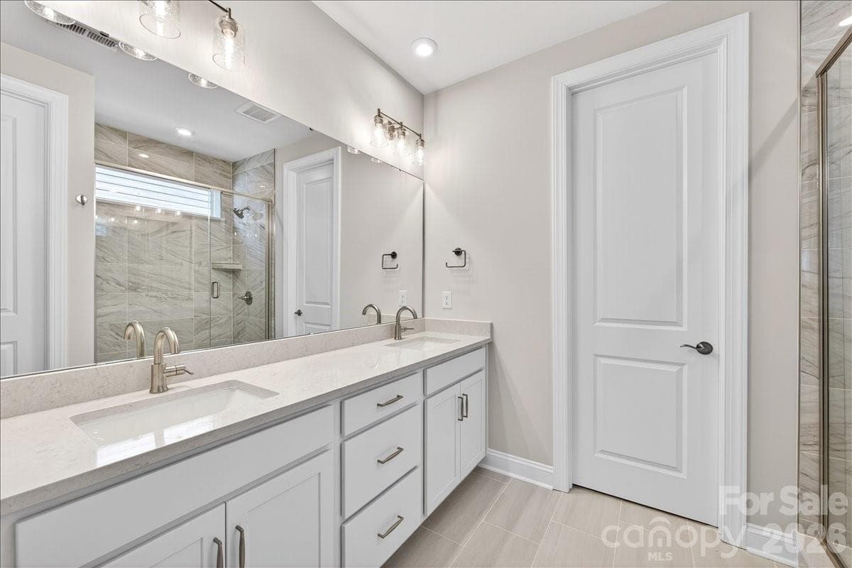 Dual vanity primary bathroom - 12015 Elsa Lane, Charlotte