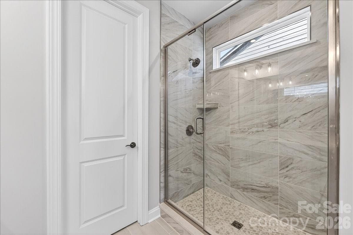 Tiled primary walk-in shower - 12015 Elsa Lane, Charlotte